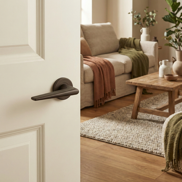 Modena Türgriff Bronze mit runder Rosette